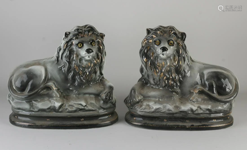 Two rare antique English Staffordshire lions. ceramics.