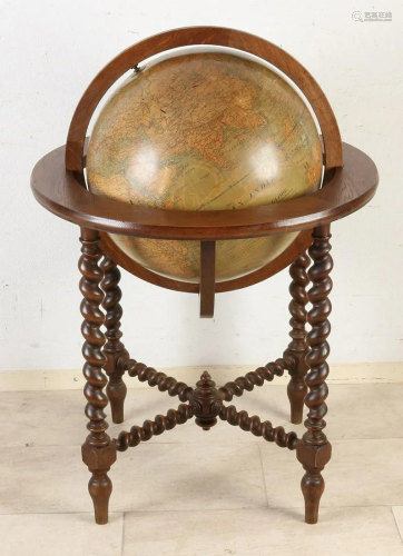 Large antique globe in oak holder. France. Circa 1900.