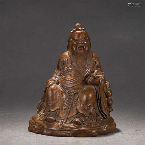 A Carved Bamboo Seated Figural