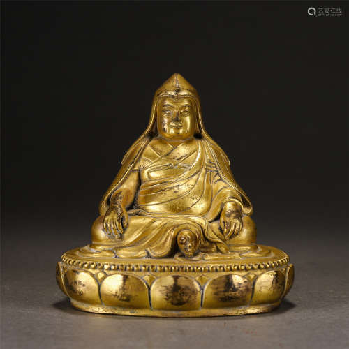 A Gilt-bronze Seated Master Guru