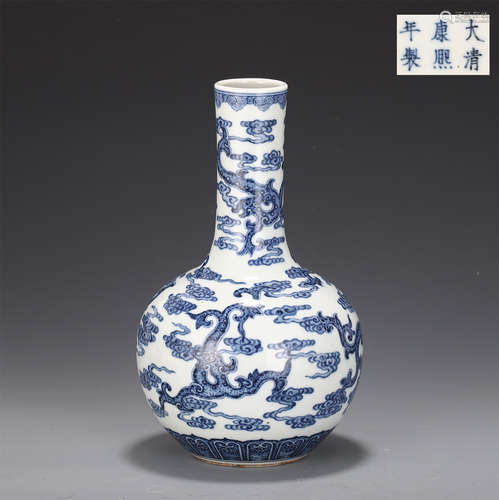 A Blue and White Dragon and Cloud Bottle Vase