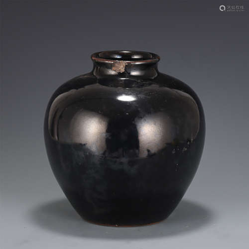 An Aubergine Glazed Jar