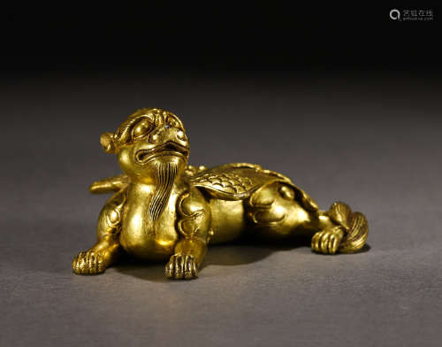 A Gilt-bronze Beast