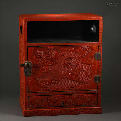 A Carved Cinnabar Lacquer Cabinet