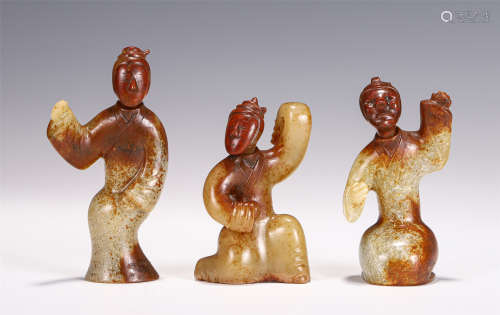 A Group of Three Carved Jade Figures