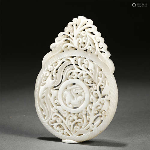 A Carved White Jade Bi