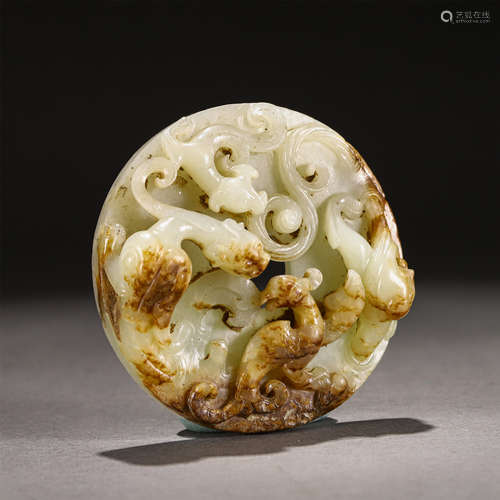 A Carved White and Russet Jade Ornament