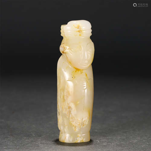 A Carved Creamy Jade Figure