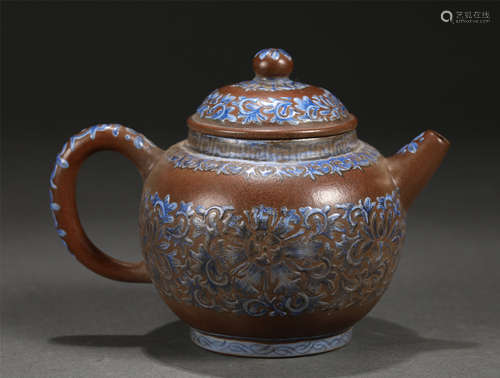 A Yixing Glazed Floral Scrolls Teapot