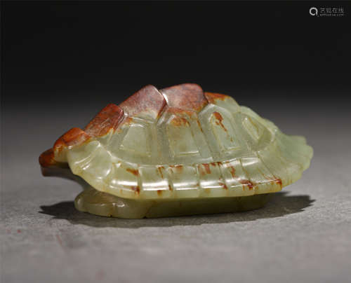 A Carved Celadon and Russet Jade Turtle Shell