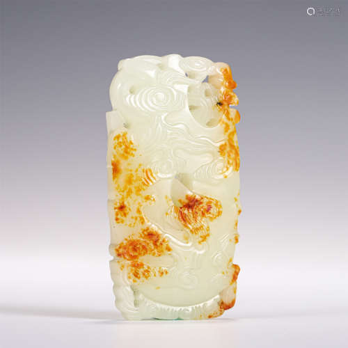 A Carved White and Russet Jade Pendant