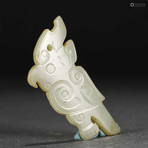 A Carved White Jade Beast