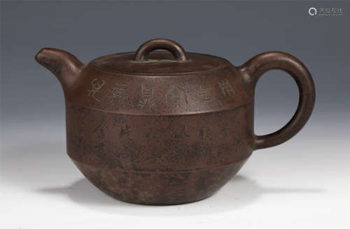 An Inscribed Yixing Glazed Teapot