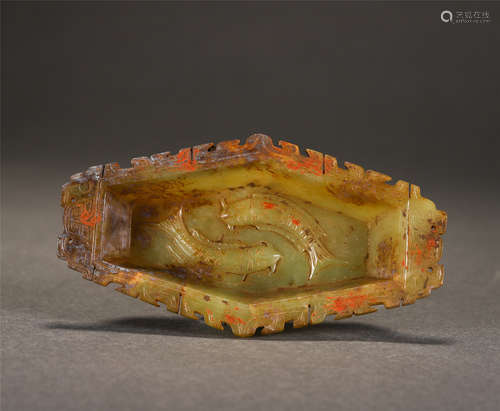 A Carved Celadon and Russet Jade Dish