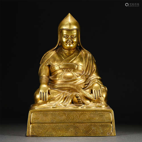 A Gilt-bronze Seated Master Guru