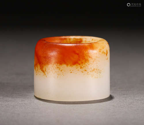 A White and Russet Jade Archers Ring