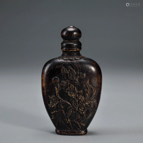 A Carved Chenxiang Snuff Bottle