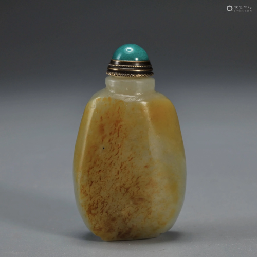 A White and Russet Jade Snuff Bottle