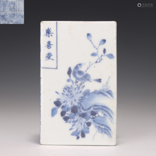 A Blue and White Floral and Bird Paper Weight