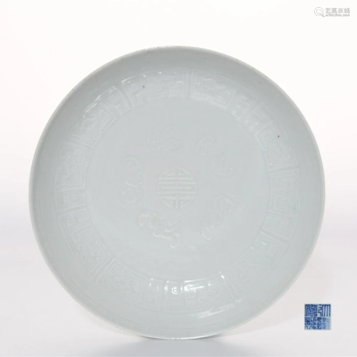 A Molded White Glazed Dish Qianlong Mark
