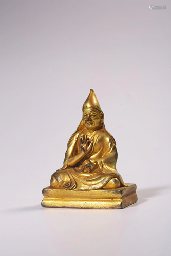 A GILT-BRONZE FIGURE OF GURU.QING PERIOD