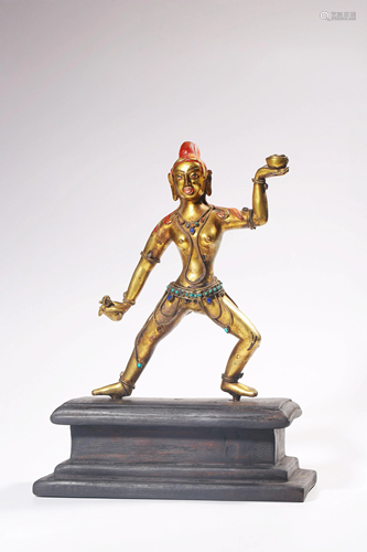 A GILT-BRONZE FIGURE OF DAKINI.QING PERIOD