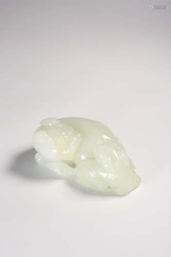 A CARVED WHITE JADE LION GROUP.QING PERIOD