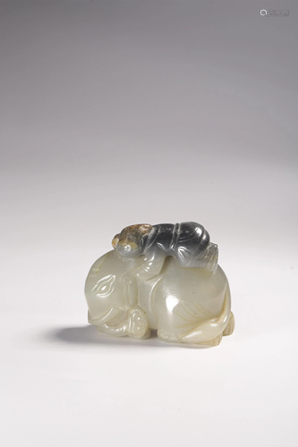 A CARVED WHITE JADE ELEPHANT AND BOY.MING PERIOD