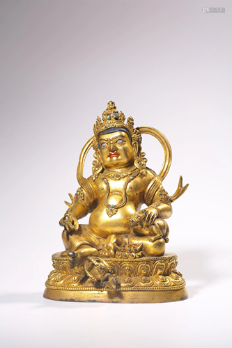 A GILT-BRONZE FIGURE OF VAISRAVANA.QING PERIOD