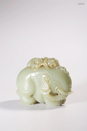 A CARVED WHITE JADE ELEPHANT AND MONKEY.QING PER…