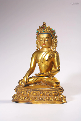 A GILT-BRONZE FIGURE OF SAKYAMUNI.QING PERIOD