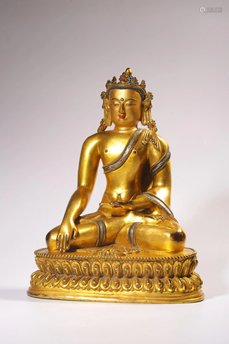 A GILT-BRONZE FIGURE OF SAKYAMUNI.QING PERIOD