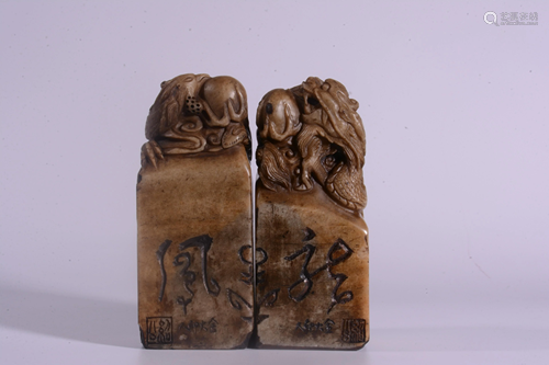 A PAIR OF SOAPSTONE SEALS