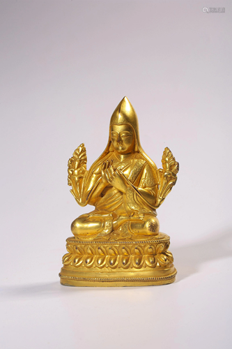 A GILT-BRONZE FIGURE OF GURU.QING PERIOD