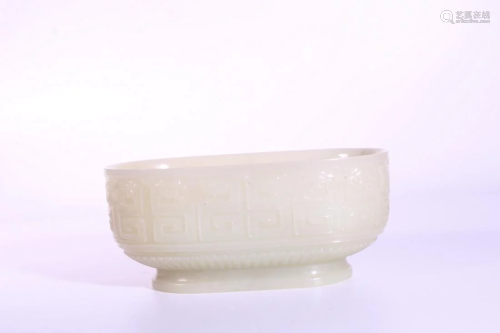 A CARVED WHITE JADE CUP.QING PERIOD