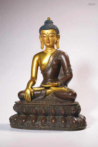 A GILT-BRONZE FIGURE OF SAKYAMUNI.QING PERIOD