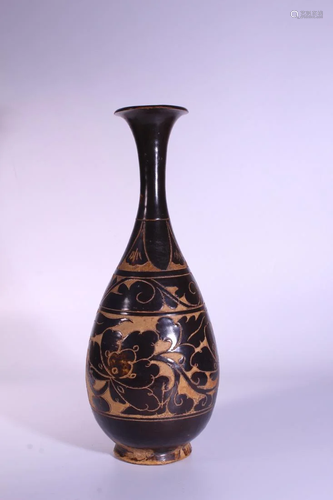 A CARVED CIZHOU-GLAZED VASE.YUHUCHUNPING