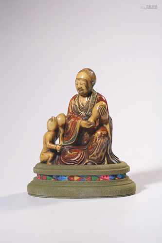 A CARVED SOAPSTONE LUOHAN.QING PERIOD