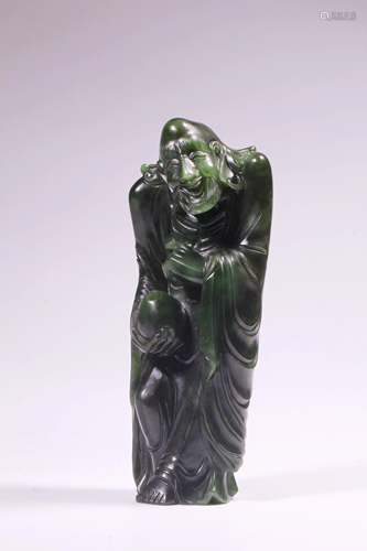 A CARVED SPINACH-JADE LUOHAN.QING PERIOD