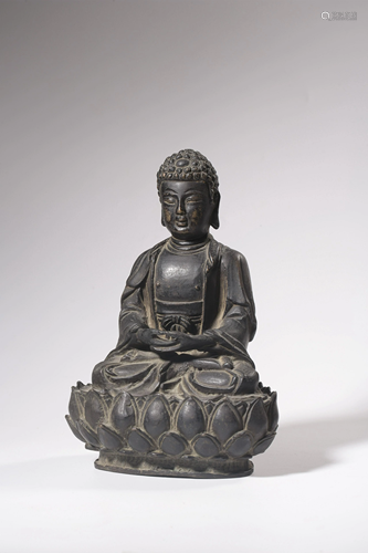 A BRONZE FIGURE OF BUDDHA