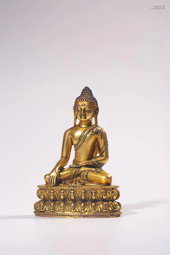 A GILT-BRONZE FIGURE OF SAKYAMUNI.QING PERIOD