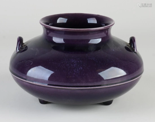 Chinese porcelain pot with handles and purple glaze.