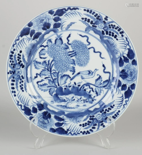 Chinese porcelain plate with garden/bird decor. Kang Xi