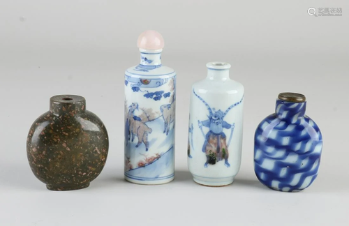 Four Chinese snuff bottles. Various. Two porcelain