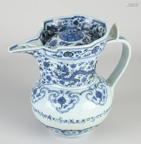 Chinese porcelain jug with floral/dragon/text decor.