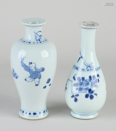 Two Chinese porcelain vases. 19th century. Decorated