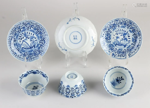 Three Chinese porcelain cups and saucers with