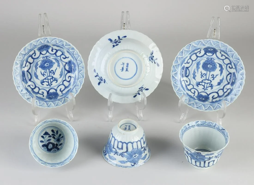 Three Chinese porcelain cups and saucers with floral