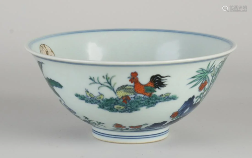 Chinese porcelain bowl with garden/chicken decor. With