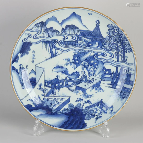 Large Chinese porcelain dish with figures in a garden